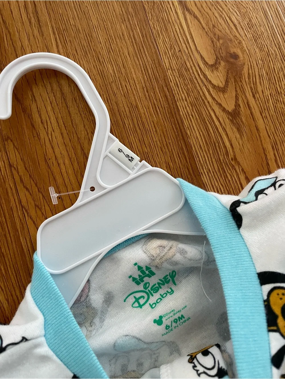 Disney baby footed sleeper and matching bibs